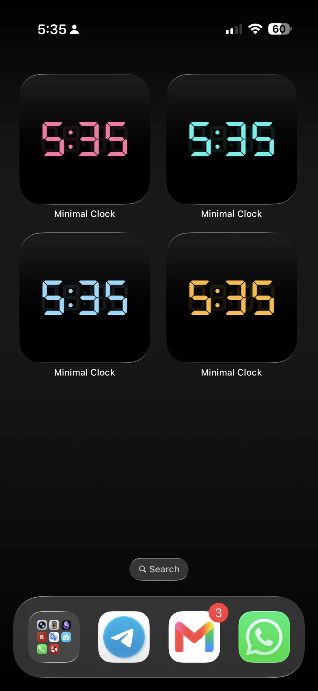 Four small clock widgets on one Home Screen, each in a different display color — rose, cyan, ice blue and amber.